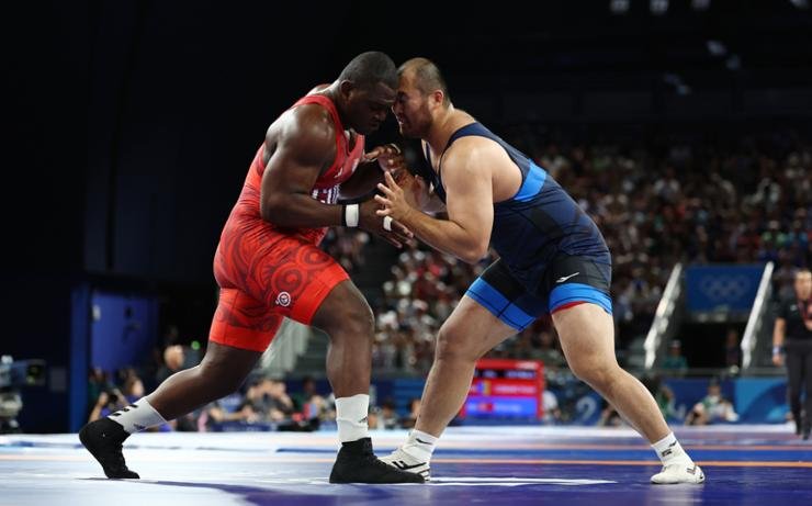 Wrestler loses Olympic debut vs. 4-time defending champion