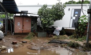 Police raid Andong City Hall after flood sweeps away wildfire housing