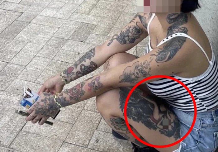Woman says Busan temple barred her over tattoo of nude woman
