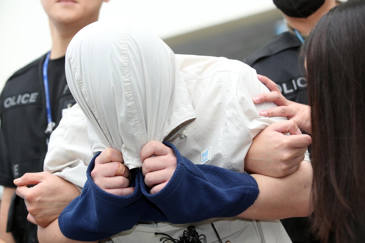 Police weigh naming lecturer accused of killing, dismembering Chinese student